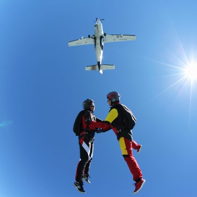 Female skydivers free falling above Leutkirch, Bavaria, Germany