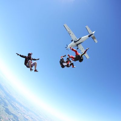 Skydivers free falling above Leutkirch, Bavaria, Germany